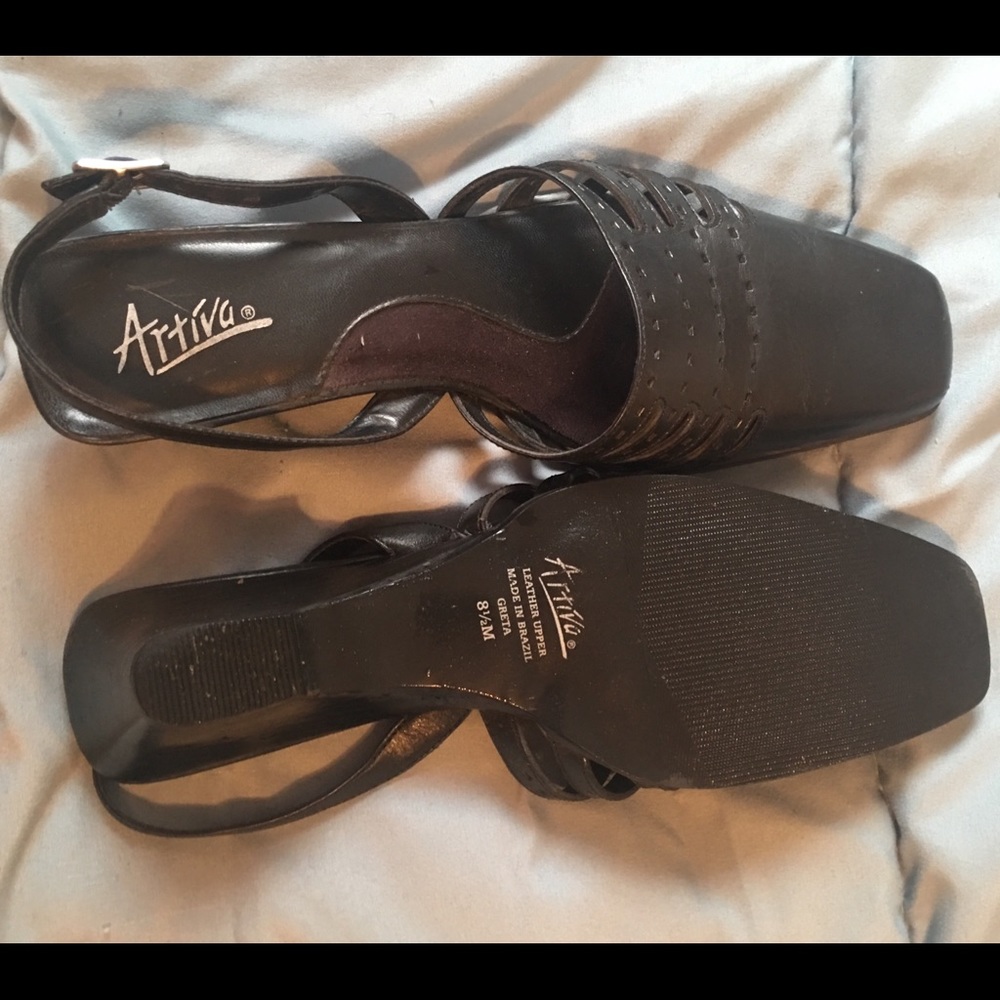 Black sling pumps